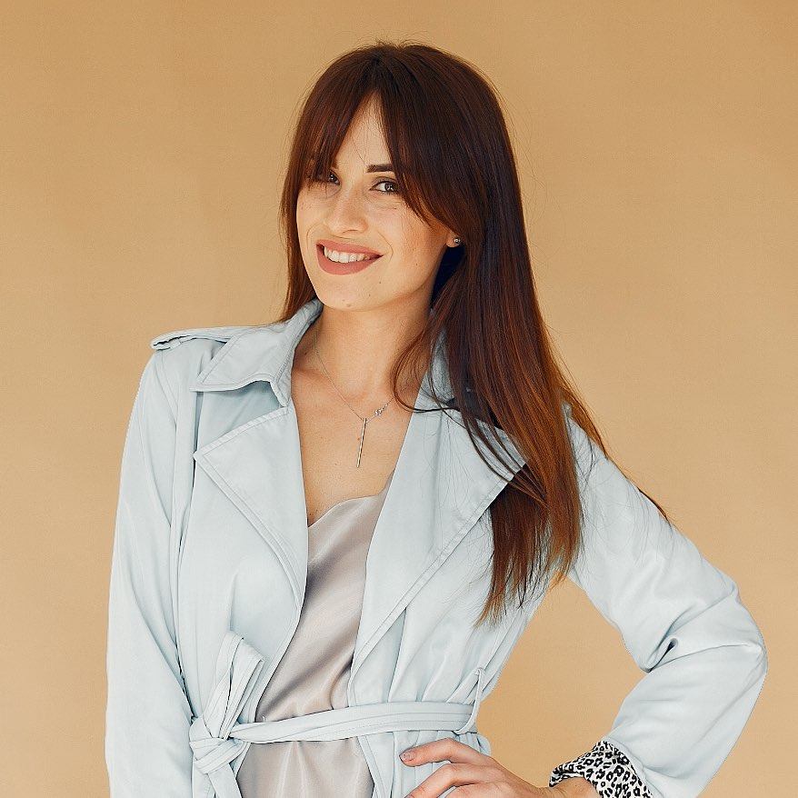 88a9af30 fashion girl posing in a photo studio on a yellow 9l8u53z